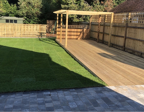 Decking and pergola installation with new blockpave and turf. 