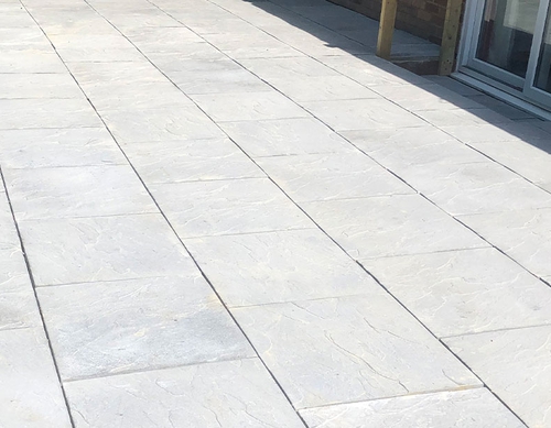 Fully paved raised garden patio.