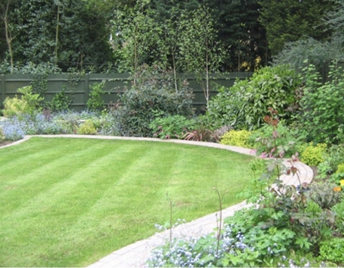 Landscaped garden laid to lawn.
