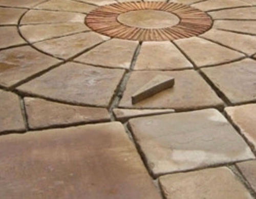 Circular featured paved garden patio.